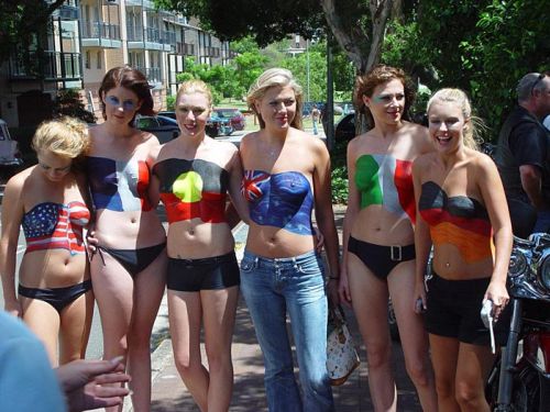 sexy girl body painting art with libra symbol, city picture, and flag in the world
